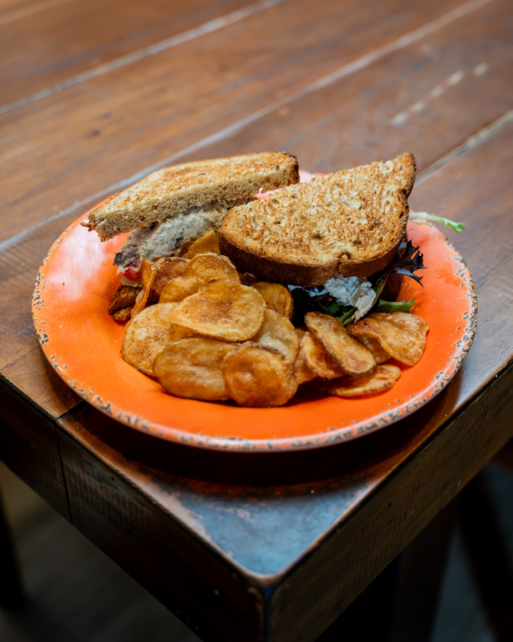 Sonoma chicken salad sandwich with house chips